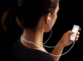 Media Center - girl using ipod
